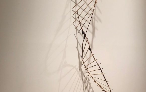 H X 30” W X 12” D (including shadow). Siberian iris, indigo-dyed grass hearts and copper wire